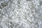 Shredded paper texture background, top view of many white paper strips