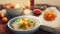 Shredded Steamed Chicken Congee served in a bowl side view on marble background traditional food. Generative AI