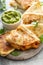 Shrimp and cheese quesadillas served with guacamole