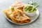 Shrimp and cheese quesadillas served with guacamole