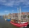 Shrimp cutter in fishing harbor in Neuharlingersiel