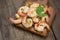 Shrimp delicious seasoning spices on wooden cutting board background /  cooked shrimps or prawns Seafood shelfish
