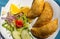 Shrimp empanadas with salad, tropical food from Mexico