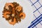 Shrimp fried in oil laid out on white plate buckwheat