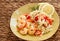 Shrimp and orzo with tomatoes