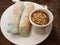 Shrimp and vegetable rolls in rice paper wrap with peanut sauce