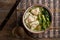 Shrimp wonton noodle soup with choy sum