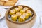 Shrimp yellow dumplings. Dim sum set. in bamboo tray on table