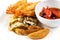 Shrimps in batter and a cup with soy sauce and ginger in a plate on an isolated white background