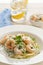 Shrimps in a creamy sauce with pasta