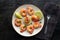 Shrimps, overhead flat lay shot. Fried shrimp with lime on a plate