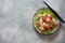 Shrimps, rice noodles, peas and grapefruit salad