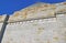 The Shrine of Remembrance memorial wall detail with dedicated inscription.