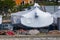 Shrink-wrapped boats stored ashore and winterized