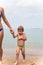 Shriveled little boy mom removes from sea