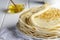 Shrovetide festival. Russian pancakes on white wooden background