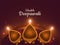 Shubh Deepawali Happy Diwali greeting card design with top view of illuminated oil lamps.