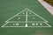 Shuffleboard game painted on pavement