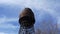 Shukhov\'s metal water tower against the blue sky timelapce. Big capacity for water, the tank on a metal support. The