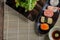 Shushi Japanese Food and salad roll on wooden table