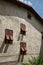 Shutters on the facade of an old residential building in the old town of Limone Sul Garda in Italy