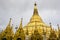 Shwedagon Pagoda in Rangoon with temple covered with foil gold