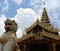 Shwedagon Pagoda Yangon with chinthe statue guarding entrance, Myanmar