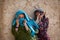 Shy girls giggle but pose for the camera in Helmand, Afghanistan