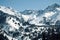 Shymbulak gorge and mountains with ski slopes. Winter mountains landscape.