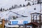Shymbulak mountain resort`s ski slopee with skiers and snowboarders. Skiers at slopes of ski resort Chimbulak.
