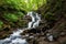 Shypit waterfall in Carpathian mountains in summer time, famous tourist destination in Zakarpattia, Ukraine. Outdoor travel