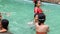 Siam Reap, Cambodia - January 13, 2017: A group of Cambodian children have fun swimming in the pool .