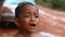 Siam Reap, Cambodia - January 13, 2017: Portrait of a crying boy . A little Cambodian boy from a poor village in the
