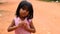 Siam Reap, Cambodia - January 13, 2017: Video portrait of a little Cambodian girl . Children from poor villages and