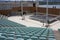 Sibenik, Croatia - May 26, 2022 - The Arena for open-air events. The comfortable plastic light blue chairs at St. Michael Fortress