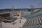 Sibenik, Croatia - May 26, 2022 - The Arena for open-air events. The comfortable plastic light blue chairs at St. Michael Fortress