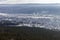 Siberian city of Ust-Kut on the Lena River among the taiga hills at the beginning of winter