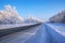 Siberian rural empty asphalt road under the snow