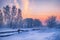 Siberian rural winter landscape. Dawn in the countryside