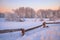 Siberian rural winter landscape. Dawn in the countryside