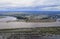 Siberian village on the banks of the river in spring flood