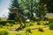 SIBIU, ROMANIA: Sculpture of dinosaur. A view over an old brick wall and a tower, which were a part of the fortification system in