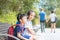 Sibling kids sitting in kowloon park