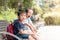 Sibling kids sitting in kowloon park