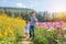 Sibling walking in flower park