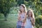 Siblings blowing soap bubbles