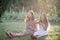 Siblings blowing soap bubbles