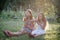 Siblings blowing soap bubbles