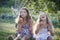 Siblings blowing soap bubbles