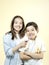 SIblings brushing teeth.